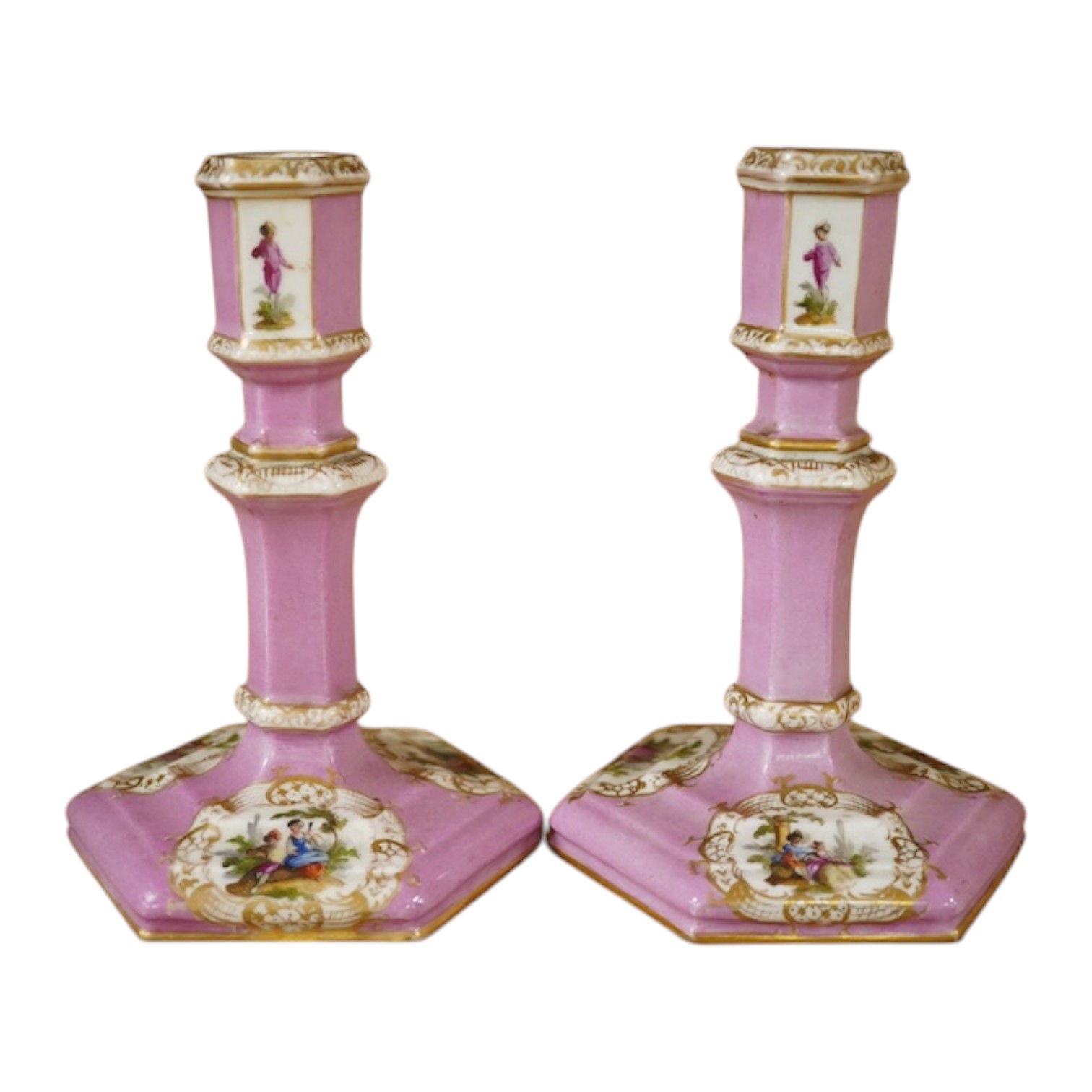 A pair of Berlin porcelain pink ground octagonal candlesticks, late 19th century, 13.5cm. Condition - worn but good